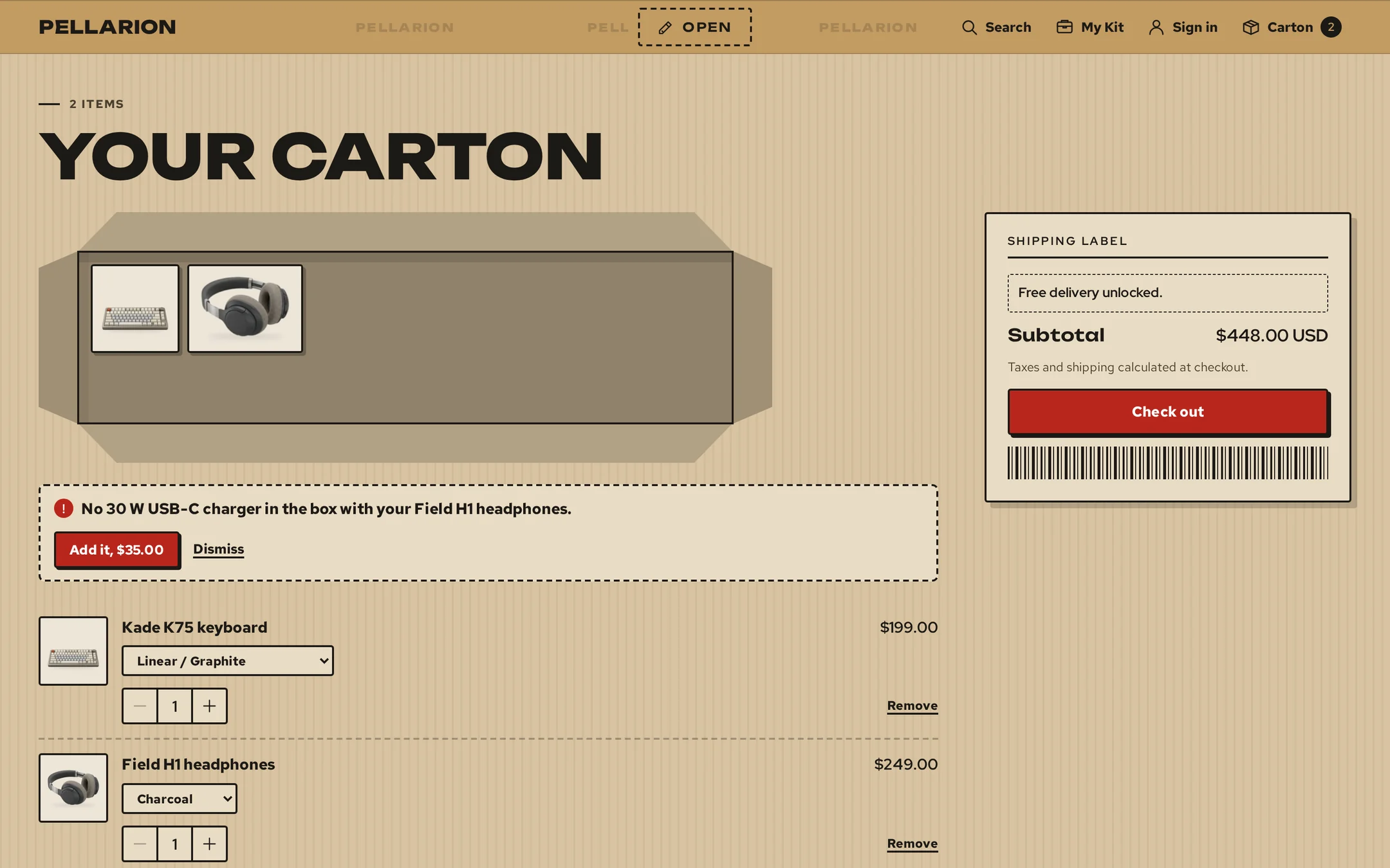 The Carton cart page: the items packed in a carton, a not-in-the-box check offering a charger, and a shipping-label summary